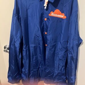 51. Nickelodeon Blue Jacket with Orange Logo